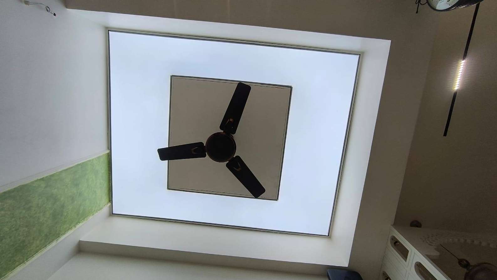Actual BION plain-white luminous ceiling integrated into a residential interior