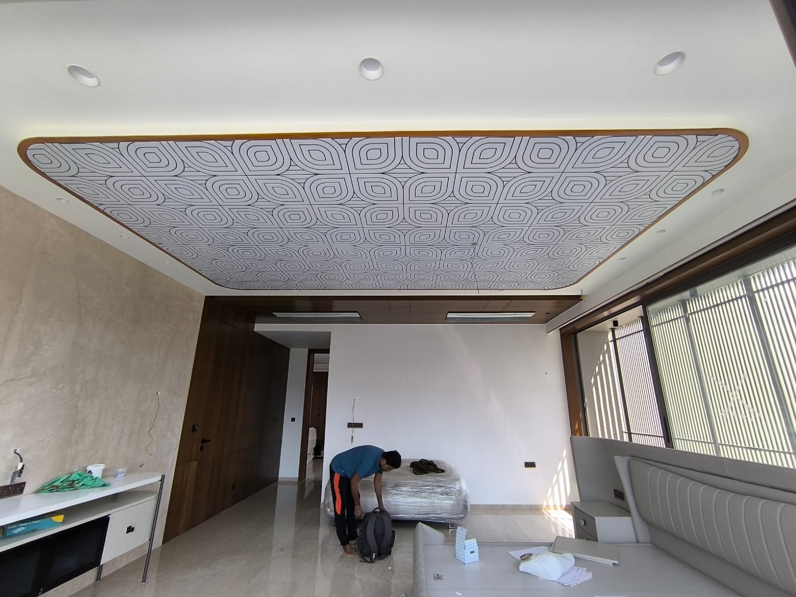 Actual BION geometric printed backlit stretch ceiling in a completed interior